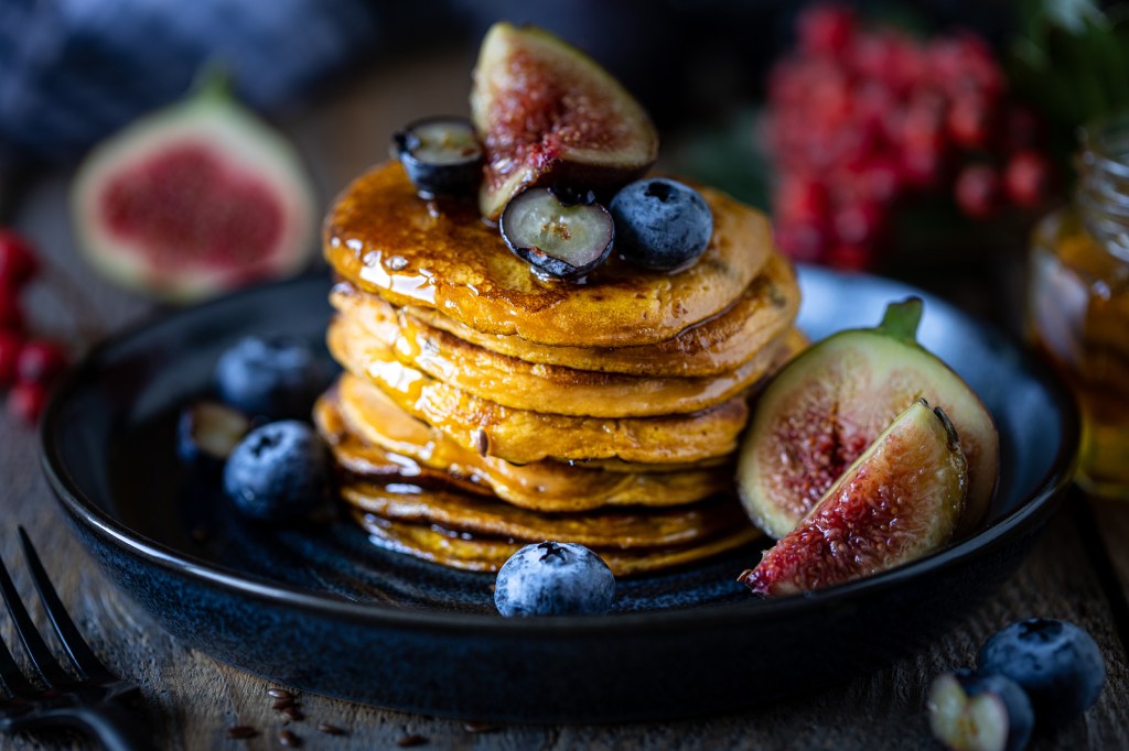 Gingerbread Pancakes with Molasses Spiked Maple&nbsp;Syrup!